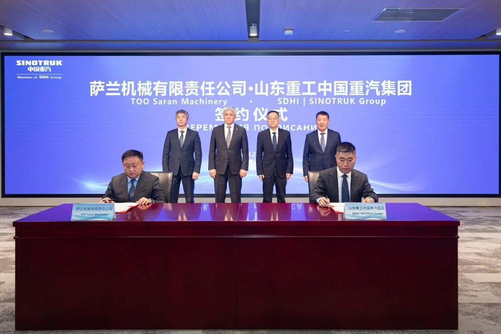 王志坚与哈萨克斯坦政府举行会议,签署协议。